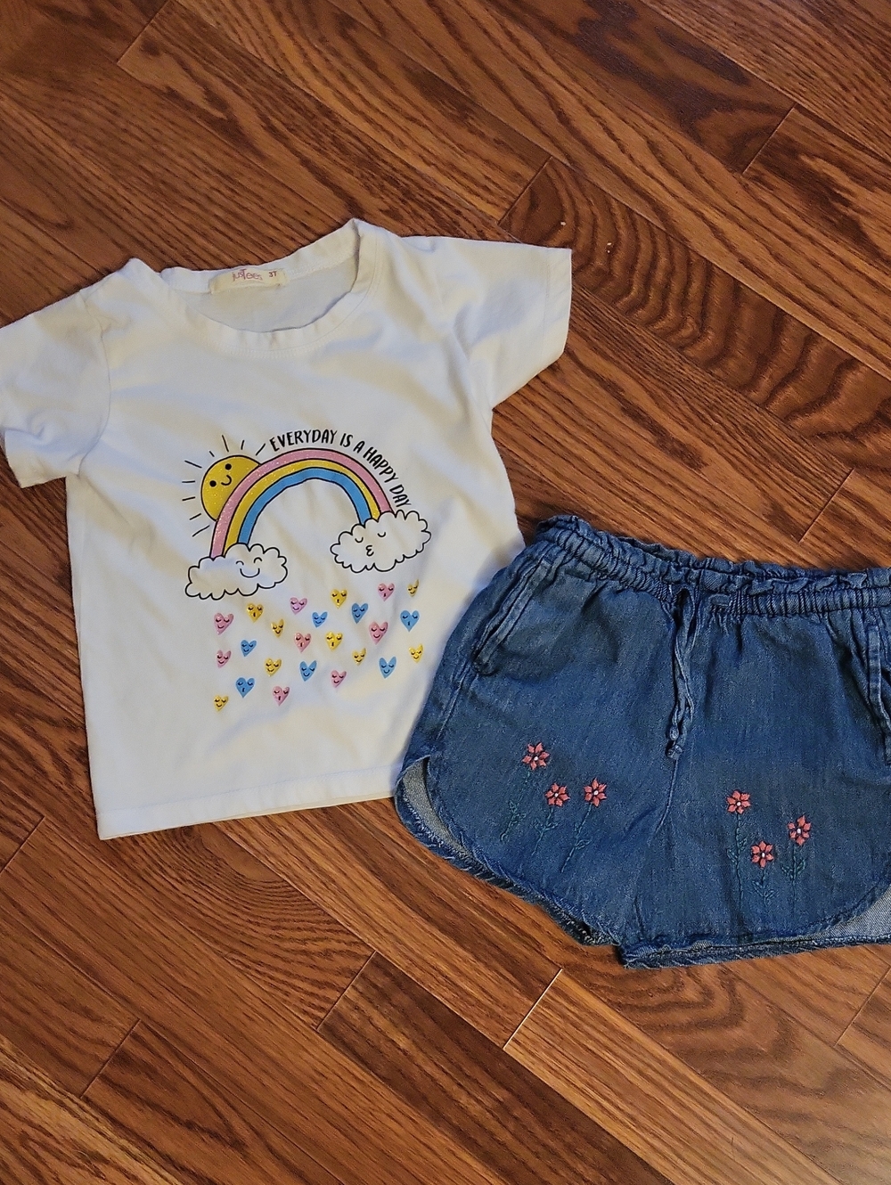 White rainbow/hearts tee shirt with denim embrodiered shorts
